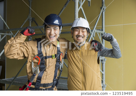 A man working at a construction site A man working at a construction site 123519495
