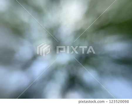 Bright blue abstract sky with green leaves in wind with blur display Bright blue abstract sky with green leaves in wind with blur display 123520098
