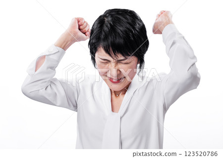 A woman expressing her emotions by waving her hands in joy 123520786