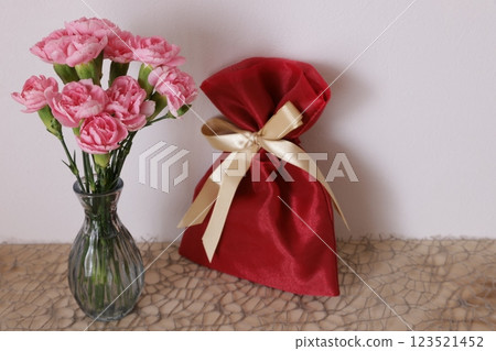 Carnations and gifts 123521452