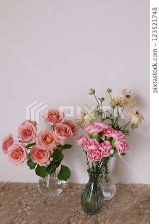 Three types of flowers in a vase Three types of flowers in a vase 123521748