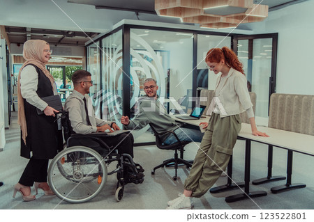 Young group of business people brainstorming together in a startup space, discussing business projects, investments, and solving challenges. 123522801