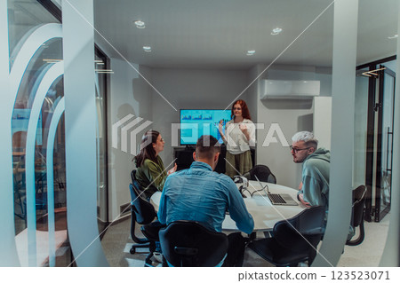 A group of young business entrepreneurs engages in a focused meeting, discussing various business strategies and collaboratively solving challenging problems, showcasing ambition, creativity, and A group of young business entrepreneurs engages in a focused meeting, discussing various business strategies and collaboratively solving challenging problems, showcasing ambition, creativity, and 123523071