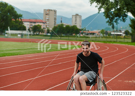 A person athlete with disability in a wheelchair racing on an outdoor track. 123523322