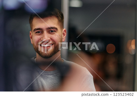 Close-up European Businessman Engaging with Colleagues in Office Discussion Close-up European Businessman Engaging with Colleagues in Office Discussion 123523402