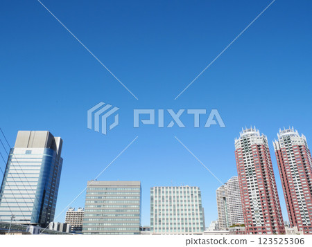 Skyscrapers shining against the blue sky | Odaiba 123525306