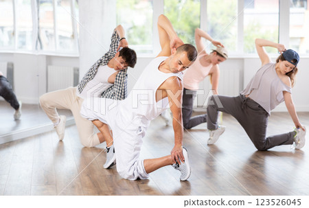 Break dance performed by a group of young dancers in dance studio 123526045