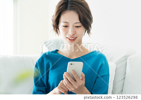 A young woman looking at a sleep with lying down 123526298