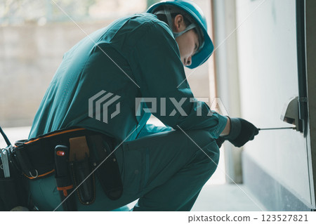 Electrician and outdoor outlet 123527821