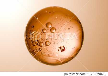 Microscopic view of cells with microorganisms and bubbles, microbiology research, stem cell exploration, cellular structures under microscope, biological study 123529825