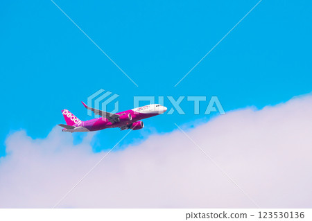 Blue sky, white clouds and passenger plane Airbus A320 Blue sky, white clouds and passenger plane Airbus A320 123530136