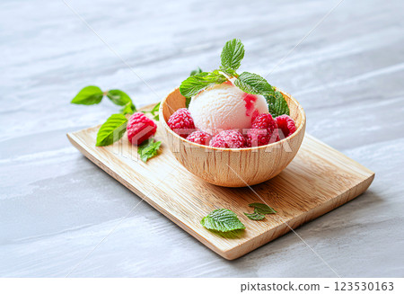 Raspberry sorbet in a hollowed out fruit, emphasizing refreshing and natural dessert concepts Raspberry sorbet in a hollowed out fruit, emphasizing refreshing and natural dessert concepts 123530163