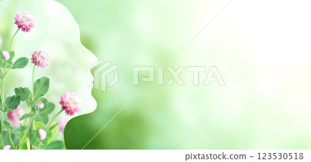 Horizontal banner with human profile made of clover flowers. Sustainable development of strategy approach to zero waste, responsible consumption. Reuse, ecology, renewable resource, eco-friendly 123530518