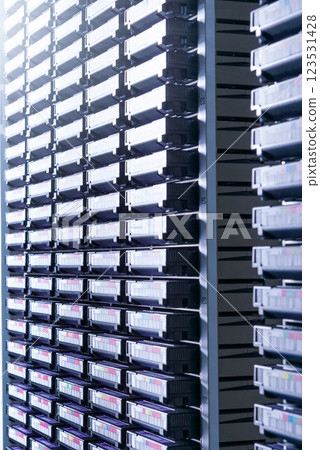 cluster of hard drives stacked inside data storage cabinet cluster of hard drives stacked inside data storage cabinet 123531428