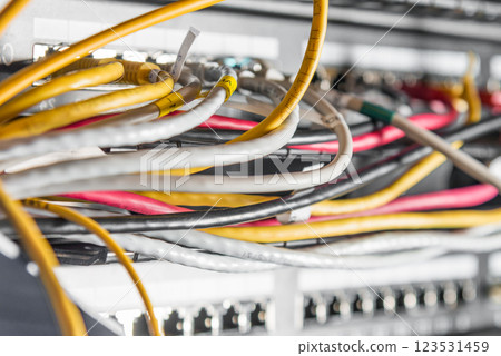 Server with patch cables plugged in ethernet ports Server with patch cables plugged in ethernet ports 123531459