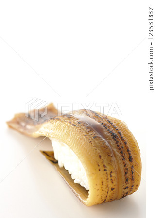 Grilled conger eel sushi photographed on a white background Grilled conger eel sushi photographed on a white background 123531837