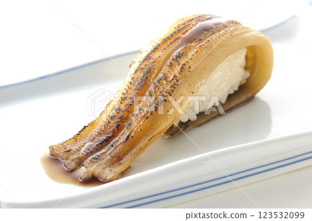Grilled conger eel sushi photographed on a white background 123532099