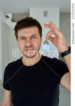Happy Man Holding Keys to New Apartment 123532458