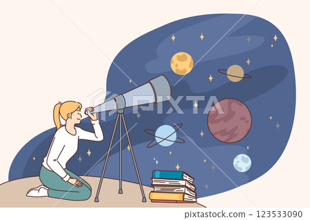 Little woman looks through telescope and studies location of planets or stars in space 123533090