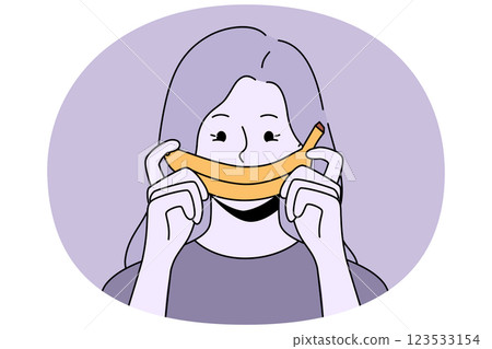 Woman with fake banana smile is experiencing frustration caused by problem in relationship Woman with fake banana smile is experiencing frustration caused by problem in relationship 123533154