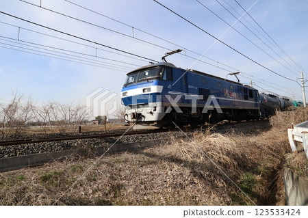 An EF210 electric locomotive running in the suburbs of Hasuda City, Saitama Prefecture in winter An EF210 electric locomotive running in the suburbs of Hasuda City, Saitama Prefecture in winter 123533424