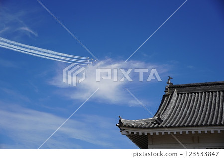 Blue Impulse flying in the blue sky Blue Impulse flying in the blue sky 123533847