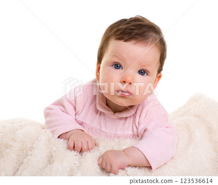 baby girl smiling in pink with winter white fur blanket baby girl smiling in pink with winter white fur blanket 123536614