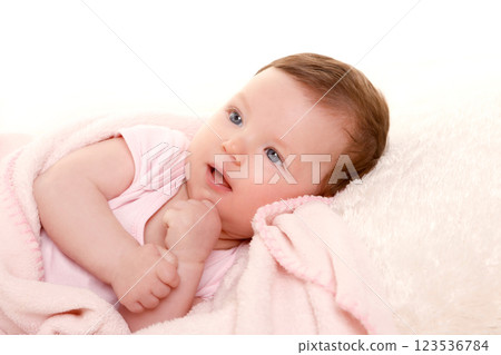 baby girl smiling dress in pink with white fur baby girl smiling dress in pink with white fur 123536784