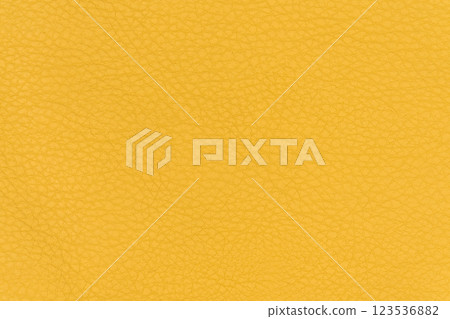 Yellow color abstract synthetic leather pattern for background. Backdrop texture for design element 123536882