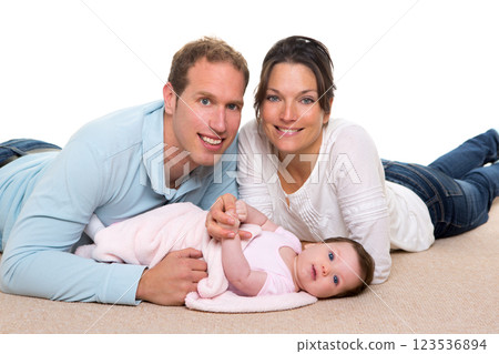 Baby mother and father happy family lying on carpet Baby mother and father happy family lying on carpet 123536894