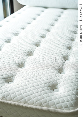 A sophisticatedly designed mattress with breathability and moderate firmness to support a comfortable sleep Close-up A sophisticatedly designed mattress with breathability and moderate firmness to support a comfortable sleep Close-up 123536921