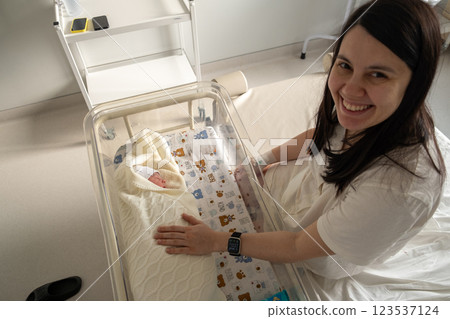 Mother with Newborn in Hospital Room 123537124