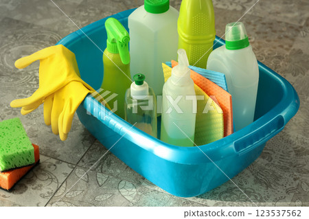 Household cleaning products and items for cleaning tile in house. Cleaning and cleanliness. Household cleaning products and items for cleaning tile in house. Cleaning and cleanliness. 123537562