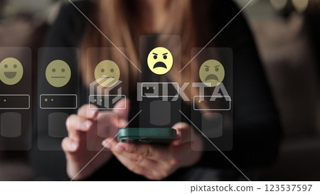 Woman holds smartphone giving good review at cafe. Close up on female hand holding smartphone rating of the quality of service,store, service and social networks. Graphic animation. 123537597