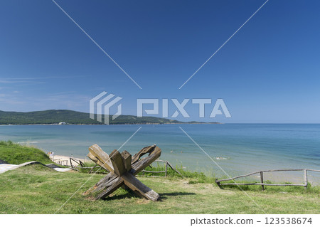 Sunny beach with sand dunes and blue sky in Bulgaria Sunny beach with sand dunes and blue sky in Bulgaria 123538674
