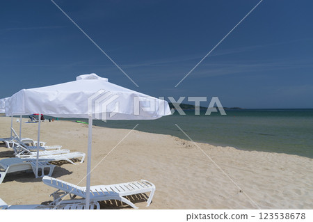 Sunny beach with sand dunes and blue sky in Bulgaria Sunny beach with sand dunes and blue sky in Bulgaria 123538678