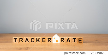 Wooden blocks with word Tracker rate. Type of variable interest rate on a loan or mortgage that follows an external benchmark as the central bank's base interest rate. Real estate concept Wooden blocks with word Tracker rate. Type of variable interest rate on a loan or mortgage that follows an external benchmark as the central bank's base interest rate. Real estate concept 123539029