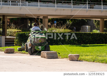 In the city park, a special car with an employee 123539323