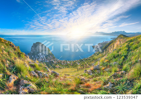 Spectacular view of Santa Flavia town with cape Zafferano and national park Orientata Pizzo Cane. Spectacular view of Santa Flavia town with cape Zafferano and national park Orientata Pizzo Cane. 123539347