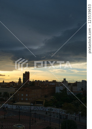 Silhouettes of the city's buildings at sunset 123539653