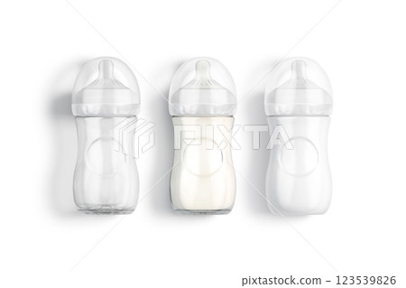Blank white plastic baby bottle with milk mockup, top view Blank white plastic baby bottle with milk mockup, top view 123539826