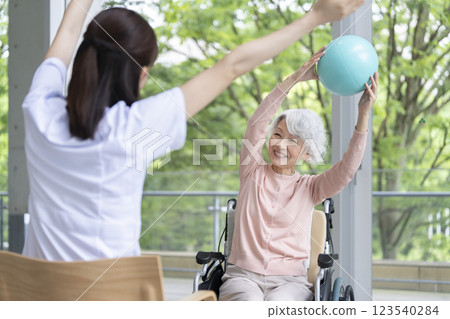 Senior woman doing ball exercises Senior woman doing ball exercises 123540284