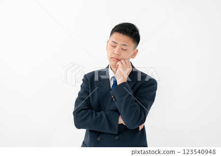 Boys, teens, uniforms, worries Boys, teens, uniforms, worries 123540948