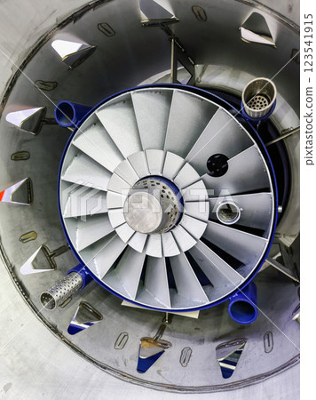 Aircraft engine turbine detail showcasing precision engineering elements in a modern aircraft 123541915