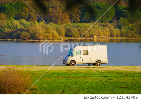 Rv caravan on lake shore. Autumn time. 123542409