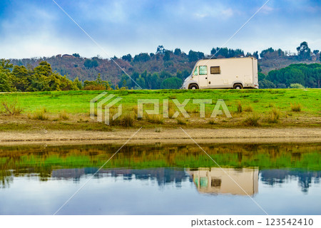 Rv caravan on lake shore. Autumn time. 123542410