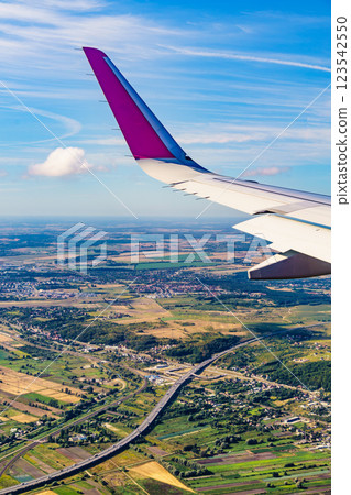 View from an airplane window to Poland 123542550