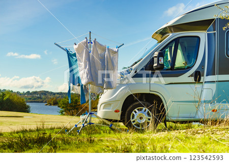 Camping. Clothes hanging to dry by camper rv. Camping. Clothes hanging to dry by camper rv. 123542593