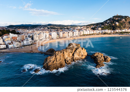Aerial view of Blanes on Mediterranean coast with Sa Palomera Rock and San Juan hill 123544376