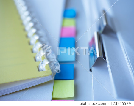 Documents and notebook on the table 123545529